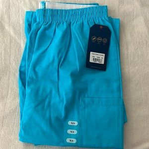 Light blue Cherokee scrub pants. XS. Never worn with tags